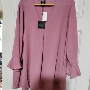 Brand new with tags gorgeous blouse from Dillard's. Size 3x.